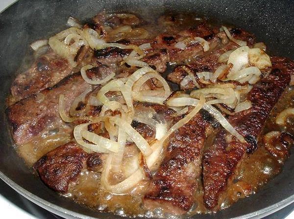 Beef liver and onion dish on a plate