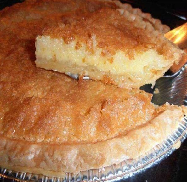 Slice of buttermilk pie on a plate