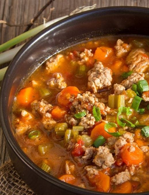 "Hamburger Slow Cooker Soup: A delicious bowl of slow-cooked goodness, featuring ground beef, fresh vegetables, and aromatic herbs."