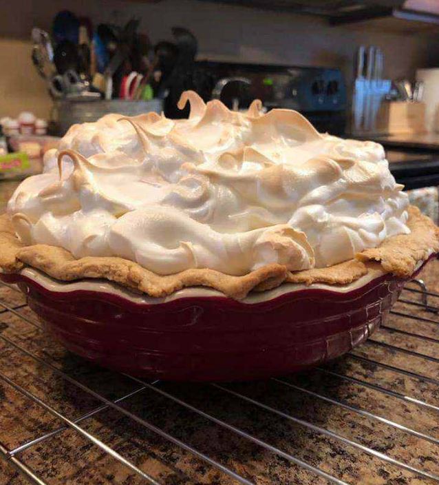 Grandmother's Lemon Meringue Pie - A golden pastry shell filled with luscious lemon filling and crowned with fluffy meringue.