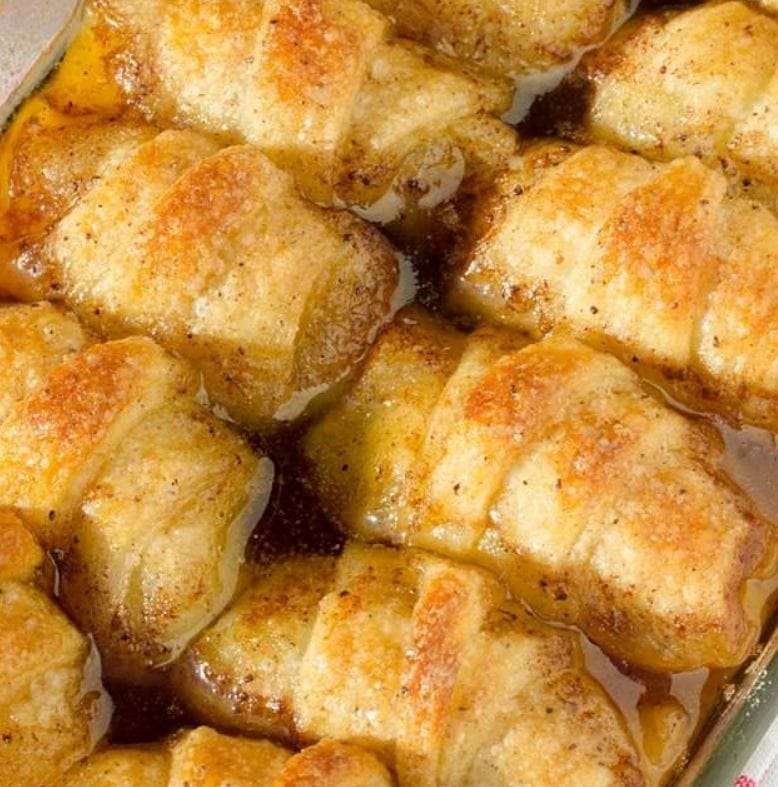 Mountain Dew Apple Dumplings Recipe - Crescent roll-wrapped apple slices bathed in a cinnamon-infused syrup with a splash of Mountain Dew.