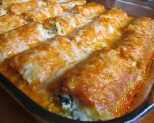 "Chicken Alfredo Lasagna Rolls on a plate - A flavorful twist on classic lasagna"