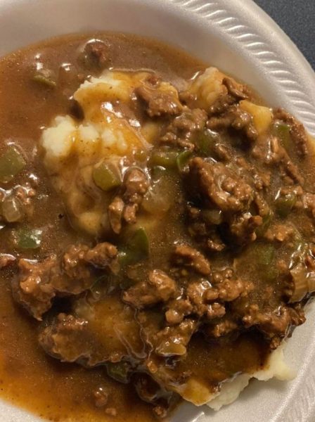 Beef gravy over mashed potatoes