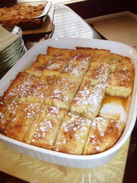 French Toast Bake: A heavenly breakfast dish with layers of Texas toast, eggs, milk, and vanilla, topped with powdered sugar. Perfect morning indulgence.