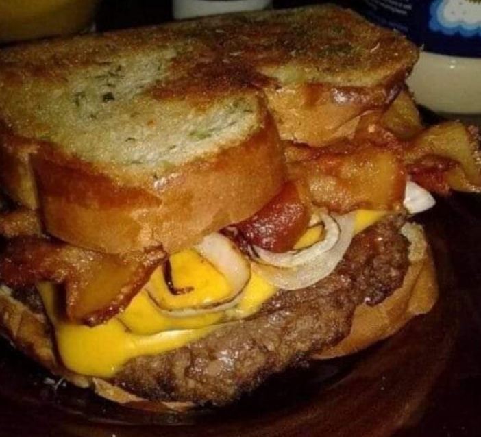 Big Mac French Toast topped with lettuce, cheese, and special sauce