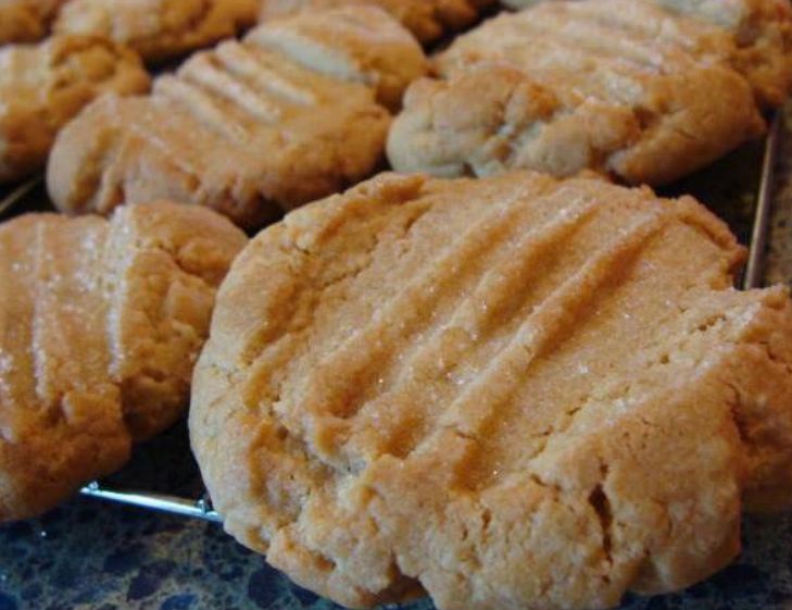 Peanut Butter Cookies - Golden perfection with a crisscross pattern, showcasing the delightful combination of butter, peanut butter, and a touch of sweetness.