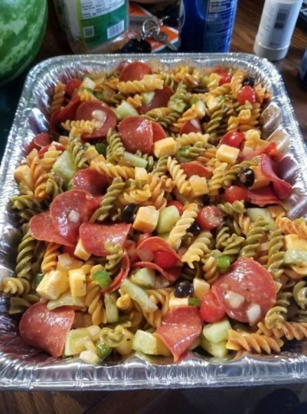 Pasta salad with colorful vegetables and zesty dressing