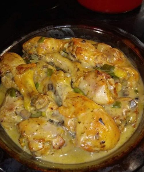 Baked Chicken Legs with Cream of Mushroom Sauce on a plate