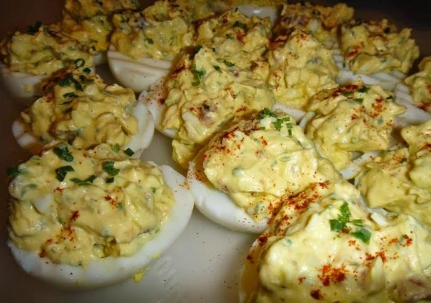 Loaded Deviled Eggs with Bacon, Chives, and Paprika