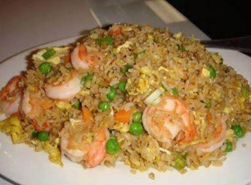 Fried Rice Shrimp on a white plate with chopsticks