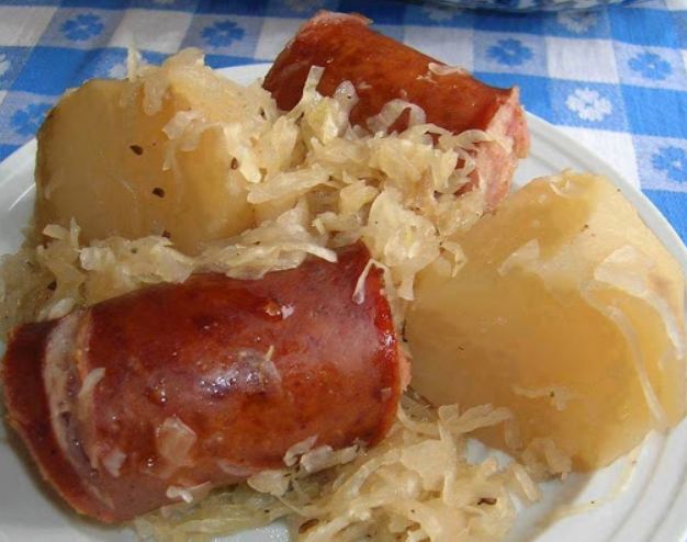 "Delicious Polish Smoked Sausage served with Sauerkraut"