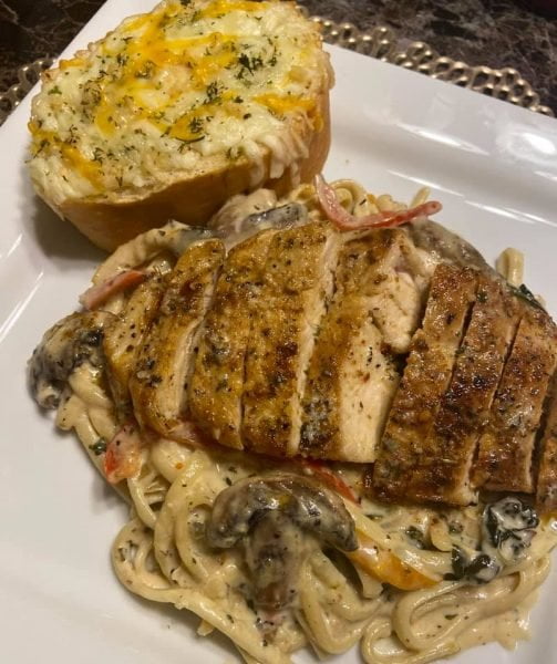 Chicken and mushroom linguine on a plate