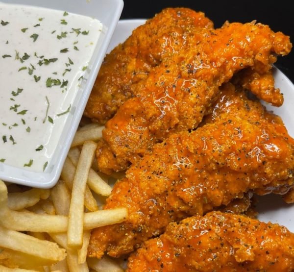 Crispy lemon pepper chicken tenders on a plate