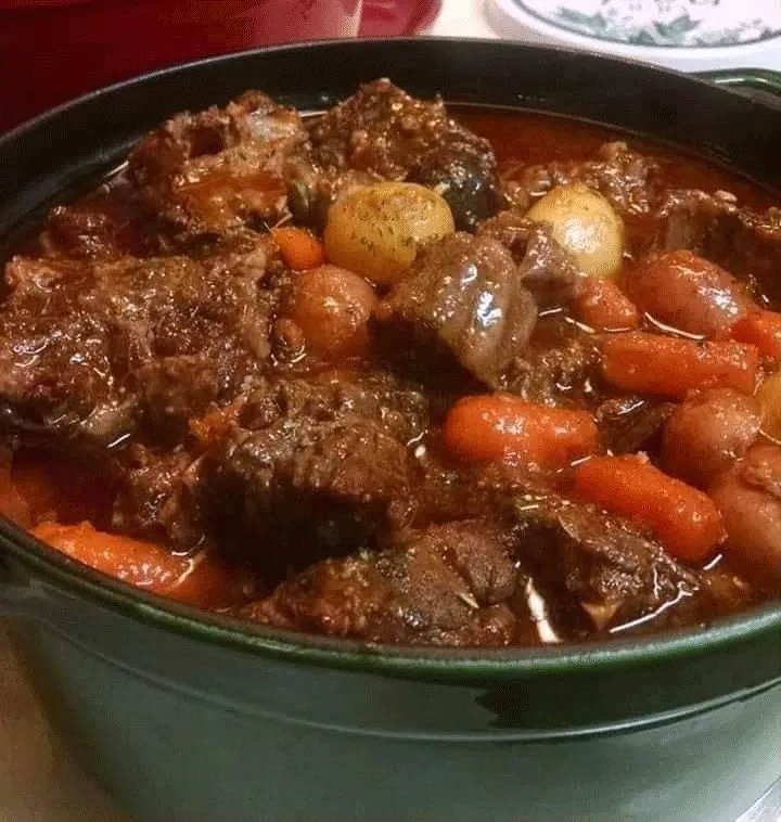 A bowl of delicious Old Fashioned Beef Stew with carrots, potatoes, and beef chunks