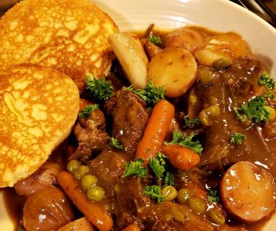 "Beef Short Rib Stew in a Rustic Pot - Delicious and Flavorful Homemade Stew"