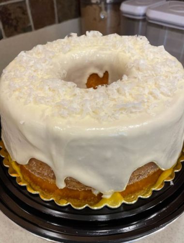 Coconut Louisiana Crunch Cake: Moist yellow cake with sugary coconut topping