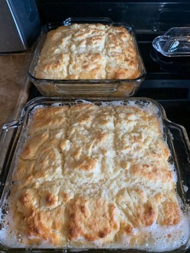 "Butter Swim Biscuits on a plate - Homemade Flaky Goodness"