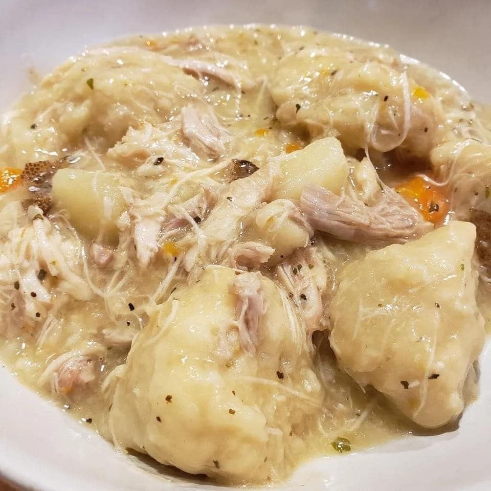 "Chicken and Dumplings cooking in a Crock Pot - A symphony of flavors with precise measurements for culinary perfection."