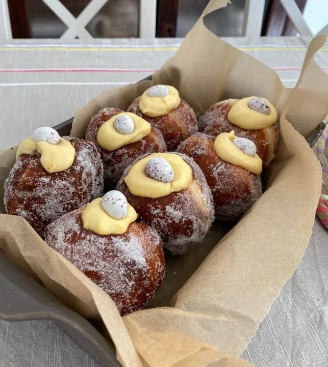 Custard doughnuts on a plate