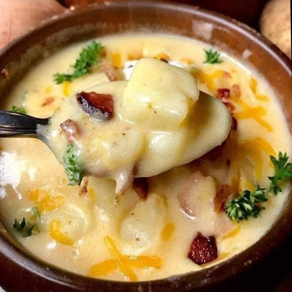 "Creamy Loaded Baked Potato Soup in a Pot - A Culinary Triumph of Flavor and Texture"