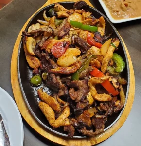 Chicken, Steak, and Shrimp Fajitas