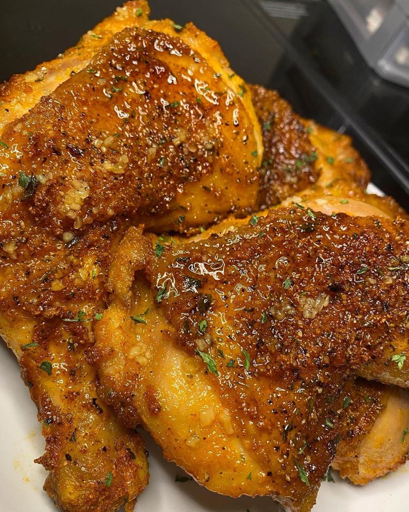 A plate of golden brown, extra crispy honey baked chicken Caption: Try this easy and delicious recipe for extra crispy honey baked chicken!