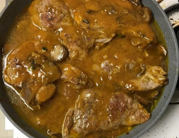 Skillet Pork Chops in Onion Mushroom Gravy