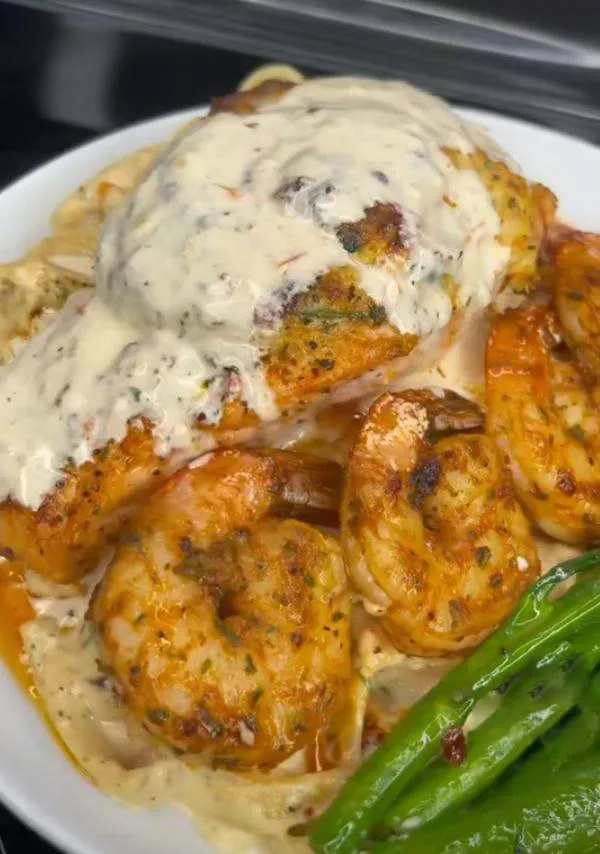 "Crab Stuffed Salmon and Shrimp over Fettuccine Alfredo Pasta, and Garlic Pepper Broccolini Recipe"