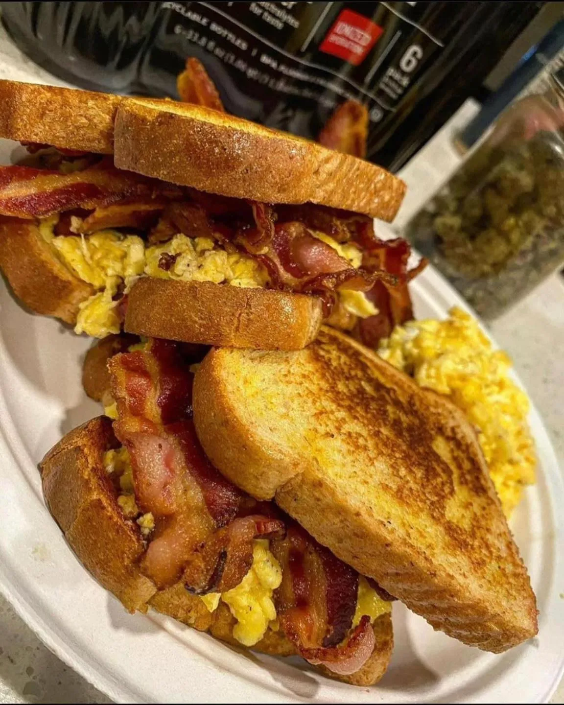 Close-up of a bacon, egg, and cheese breakfast sandwich made in an air fryer