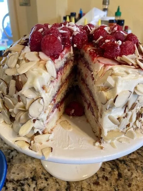 "Almond raspberry cake with white chocolate amaretto buttercream"