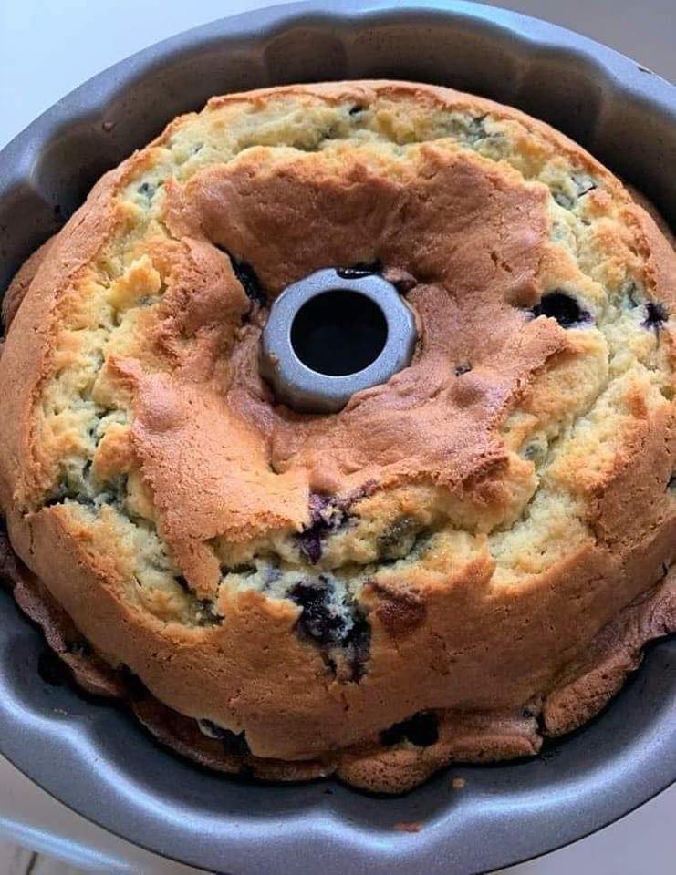Blueberry Sour Cream Coffee Cake with fresh blueberries on top