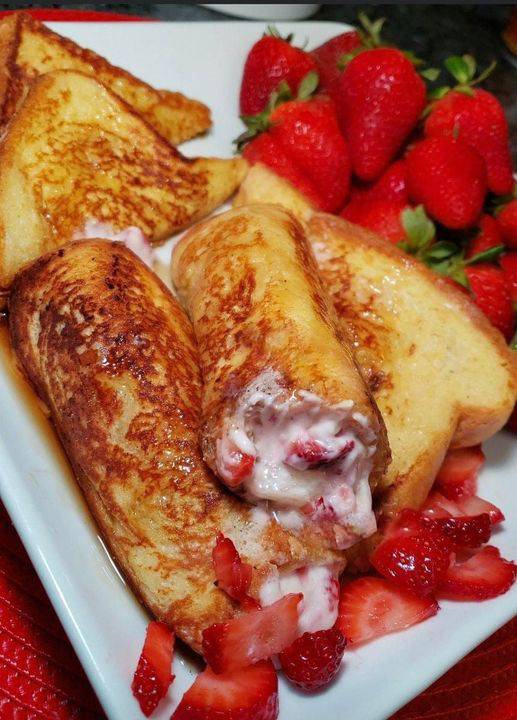 "Strawberry Cream Cheese French Toast Roll-Ups: A visual feast of swirls and flavors in every bite."