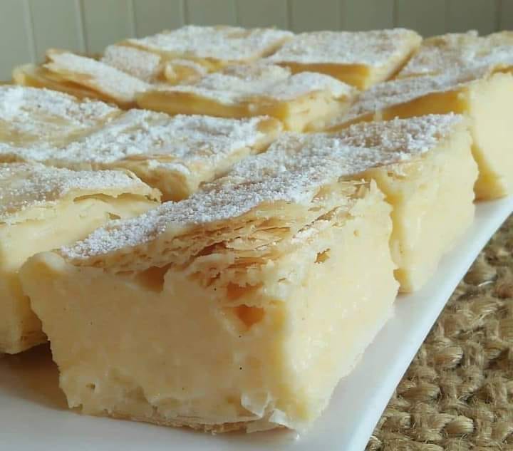 Vanilla Custard Bars - Flaky puff pastry layers embracing creamy vanilla custard.