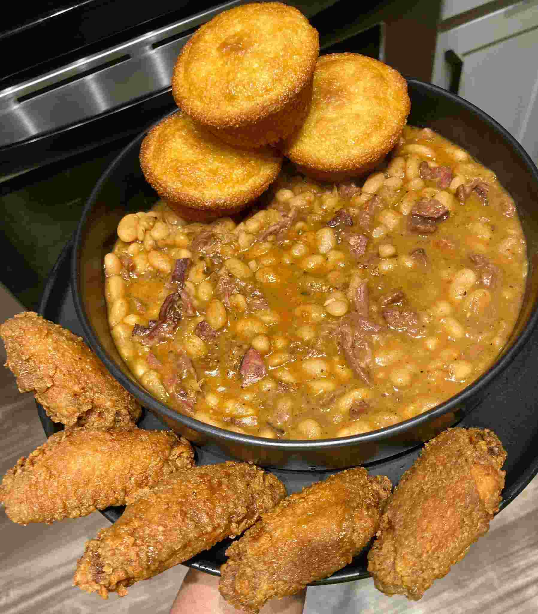 Great Northern Beans with Smoked Turkey, Beef Sausage, Cornbread, and Cajun Wings Recipe