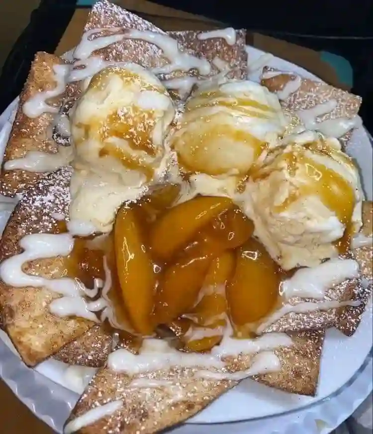 Hot Peach Cobbler with Vanilla Ice cream